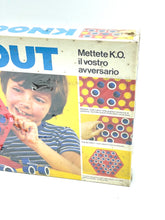 Load image into Gallery viewer, MB Milton Bradley Vintage Knock Out game box held by a child, colorful design visible.
