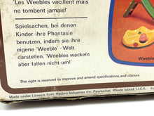 Load image into Gallery viewer, Hasbro WEEBLE WOBBLE AIRPORT PLAY SET packaging detail showing text description.
