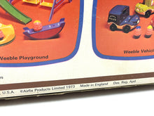 Load image into Gallery viewer, Hasbro WEEBLE WOBBLE AIRPORT PLAY SET packaging detail featuring illustrated components.
