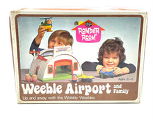 Load image into Gallery viewer, Hasbro WEEBLE WOBBLE AIRPORT PLAY SET packaging front view with vibrant colors.
