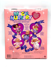 Load image into Gallery viewer, Back view of the Magic Nursery packaging with character illustrations and details.
