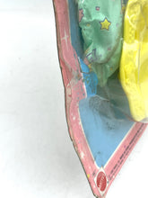 Load image into Gallery viewer, Side view of a colorful plastic mold featuring varied colors and a textured surface.
