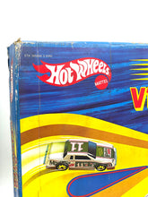 Carica l'immagine nel visualizzatore di Gallery, Close-up of the Hot Wheels logo with colorful design elements.
