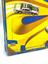 Carica l'immagine nel visualizzatore di Gallery, Detail of the track design from the Hot Wheels Speed Shifter 500 Set with curved track and vehicle illustration.
