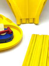 Carica l'immagine nel visualizzatore di Gallery, Hot Wheels Speed Shifter 500 yellow plastic parts with various shapes on a white background.
