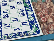 Load image into Gallery viewer, Detail close-up of Loopy de Loop bingo game board with numbered tiles and decorative border.
