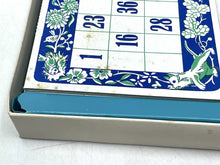 Load image into Gallery viewer, Detail close-up of Loopy de Loop bingo game box edge showing game board.
