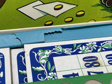 Load image into Gallery viewer, Detail close-up of Loopy de Loop board game components featuring cards and tokens.
