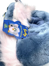 Load image into Gallery viewer, Detail view of the bottom of a blue Vintage Furby Slipper with a size label.
