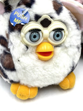 Load image into Gallery viewer, Close-up of a white and brown plush toy with big eyes and fluffy texture.
