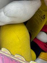 Load image into Gallery viewer, Detail close-up of Mickey Mouse plush leg with soft material
