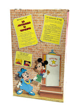 Load image into Gallery viewer, Vintage toy box packaging for 1986 Mickey Mouse figure with informational text.
