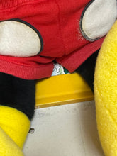 Load image into Gallery viewer, Detail view of large yellow plush toy with red, yellow, and black colors.
