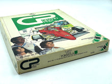 Load image into Gallery viewer, Side view of GRAND PRIX board game box with illustrated cover and logo.
