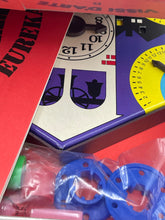 Carica l'immagine nel visualizzatore di Gallery, Detail close-up of game components including game board and colorful pieces.
