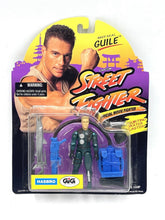 Load image into Gallery viewer, 1993 street fighter 2 guile figure packaging with cardboard backing
