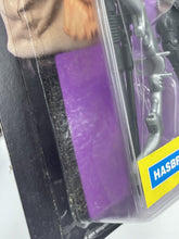 Load image into Gallery viewer, 1993 street fighter 2 guile figure in purple packaging with visible product

