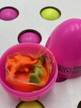 Load image into Gallery viewer, GIOCHI PREZIOSI open egg showing colorful contents inside.
