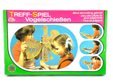 Load image into Gallery viewer, Packaging view of the 80's Bird Shooting game wood toy with colorful illustrations.
