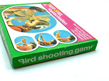 Load image into Gallery viewer, Another side view of the 80's Bird Shooting game wood toy packaging with vibrant colors.
