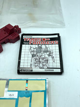 Load image into Gallery viewer, Transformers G1 Metroplex packaging detail with instruction manual and various labels on a white background.
