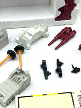 Load image into Gallery viewer, Transformers G1 Metroplex toy parts featuring multiple pieces on a white background.
