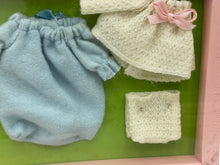 Load image into Gallery viewer, Detail view of Italocremona vintage dress set featuring puffy sleeves and bow decoration in blue and white.
