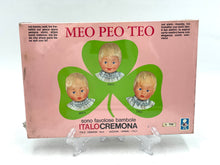 Load image into Gallery viewer, Italocremona vintage dress set packaging with colorful design and three baby faces.
