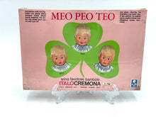 Load image into Gallery viewer, Italocremona vintage dress set packaging displaying three baby faces in pink and green.
