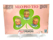 Load image into Gallery viewer, Italocremona vintage dress set packaging showing three doll heads with a clover design in pink and green.
