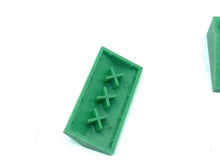 Load image into Gallery viewer, LEGO green plastic bricks close-up detail showing three studs and rectangular shape.
