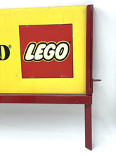 Carica l'immagine nel visualizzatore di Gallery, Close-up detail of the LEGOLAND logo on the sign with a white background.
