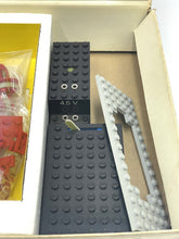 Load image into Gallery viewer, Detail view of LEGO components including rectangular and angled pieces.
