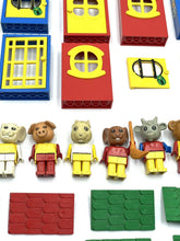 Carica l'immagine nel visualizzatore di Gallery, LEGO 70's Fabuland colorful building blocks and figures in red, blue, yellow, and green.
