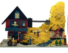 Carica l'immagine nel visualizzatore di Gallery, LEGO motorized mine set side view showing detailed barn structure and mini figures.
