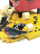 Carica l'immagine nel visualizzatore di Gallery, Detail of a black chicken figure with a pixelated design.
