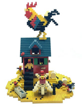 Carica l'immagine nel visualizzatore di Gallery, LEGO advertising store display front view featuring colorful house with rooster.
