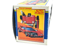 Load image into Gallery viewer, Takara Transformers G1 Sideswipe colorful packaging with robot and car illustrations in red, yellow, and orange.
