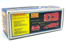 Load image into Gallery viewer, Takara Transformers G1 Sideswipe toy car packaging featuring illustrated car and detailed description in red, black, and y…
