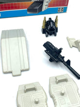 Load image into Gallery viewer, Close-up of toy parts and packaging for Transformers Silverbolt.
