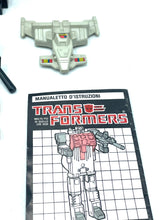 Load image into Gallery viewer, Detail view of toy parts and instruction manual for Silverbolt.

