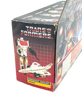 Load image into Gallery viewer, Transformers toy box packaging showcasing illustrated design and window display.
