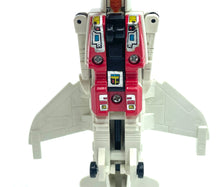 Load image into Gallery viewer, Front view of Takara GiG Transformers G1 Slingshot showcasing cockpit details and colorful buttons.
