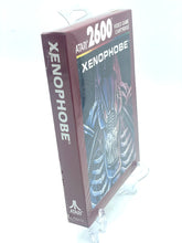 Load image into Gallery viewer, Atari 2600 Xenophobe game box side view showcasing the game title label.
