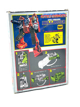 Load image into Gallery viewer, Back view of 80's Robot Vanguard Astro changers Bulldozer packaging with instructions and graphics.
