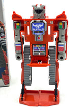 Load image into Gallery viewer, Front view of 80's Robot Vanguard Astro changers Bulldozer in standing pose with detailed face.
