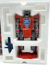 Load image into Gallery viewer, In packaging shot of 80's Robot Vanguard Astro changers Bulldozer in robot mode.
