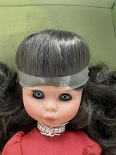 Load image into Gallery viewer, Front view of Migliorati Bambola Vania doll in red dress with white lace and curly hair.
