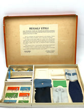 Load image into Gallery viewer, Spear's Game open box displaying game pieces and instruction sheet.
