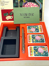Load image into Gallery viewer, Detail close-up of game components including colorful game cards and insert tray.
